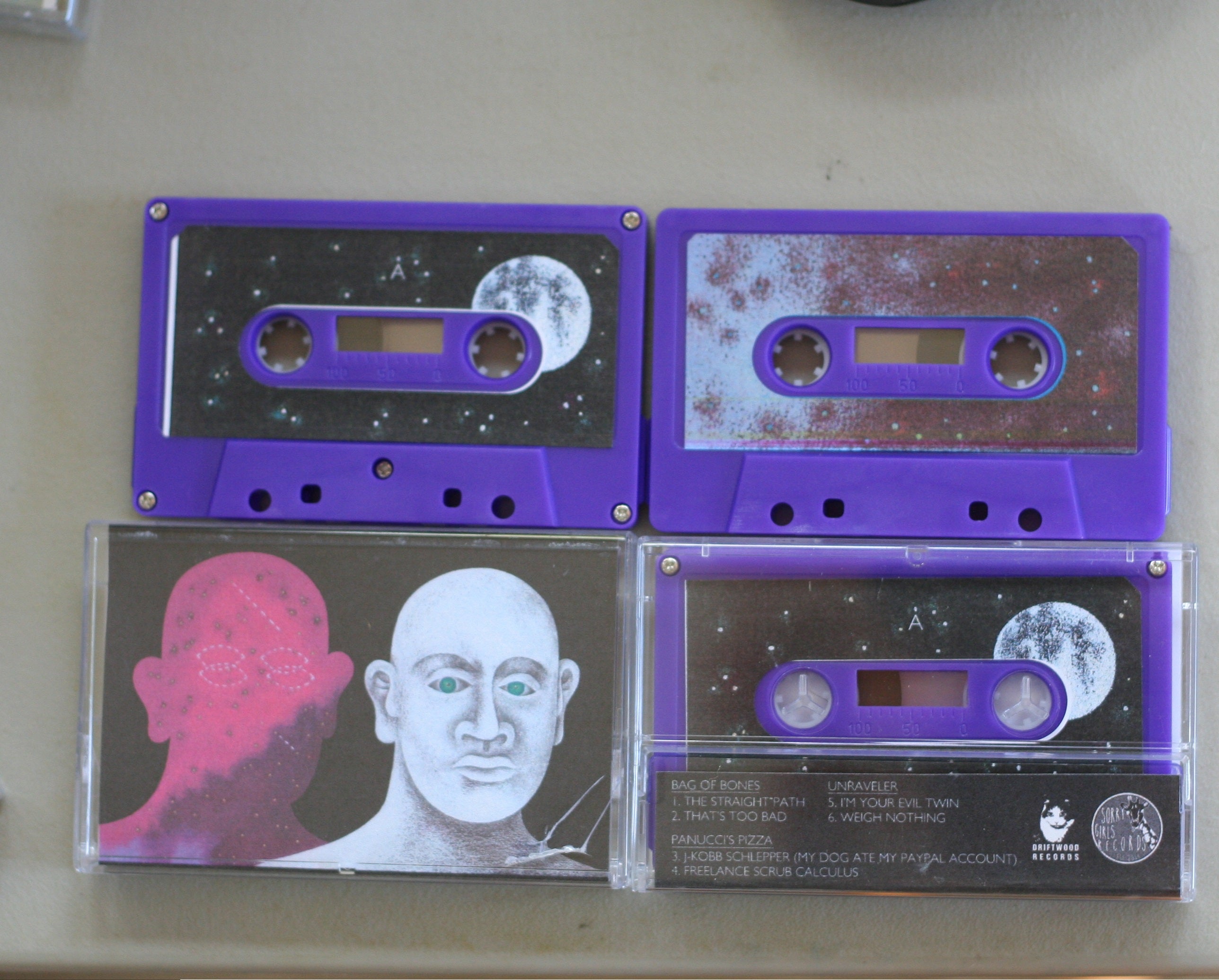Panucci's Pizza / Bag of Bones / Unraveler split Cassette Tape